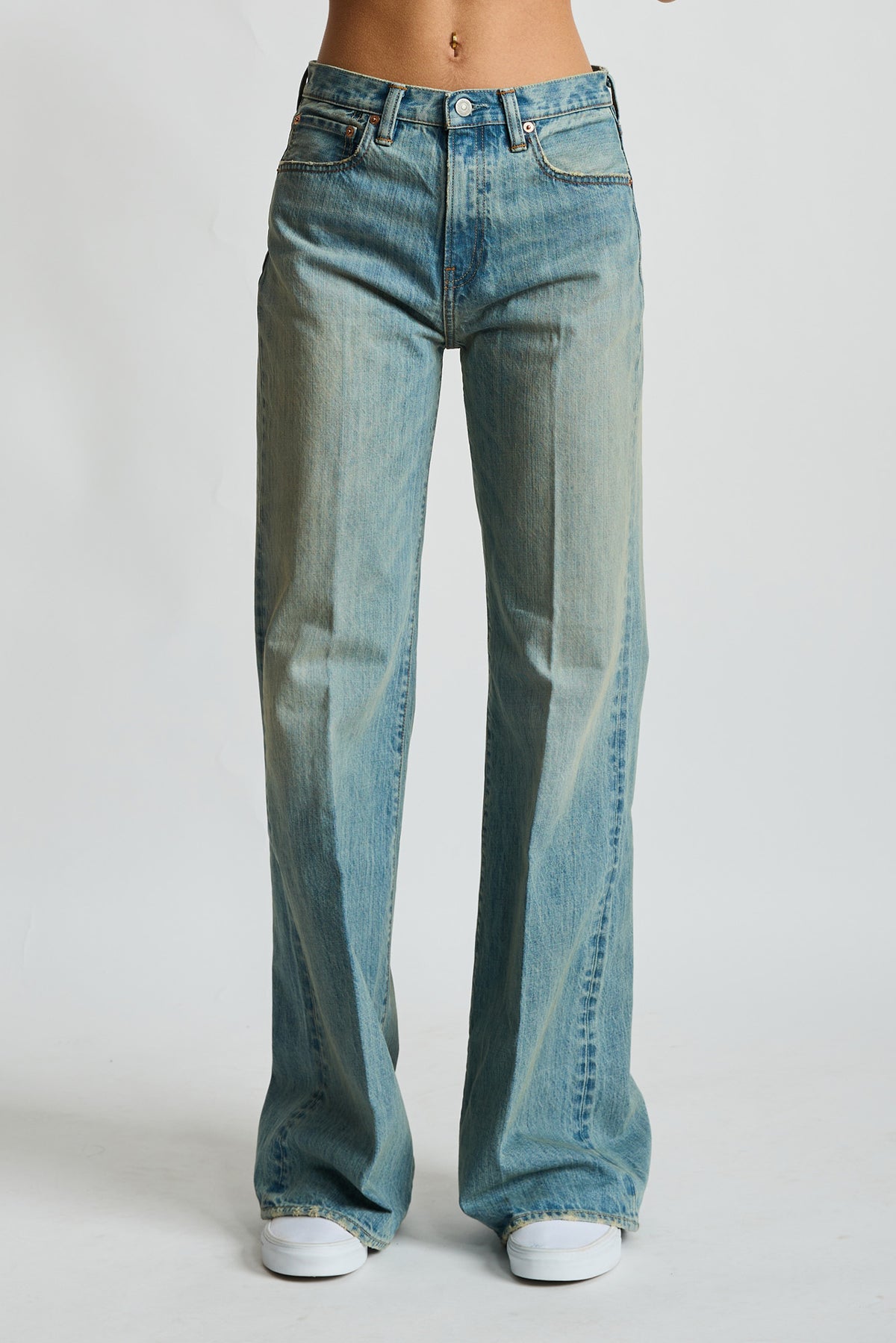 Light indigo wide-leg jeans with five-pocket styling and button fly.