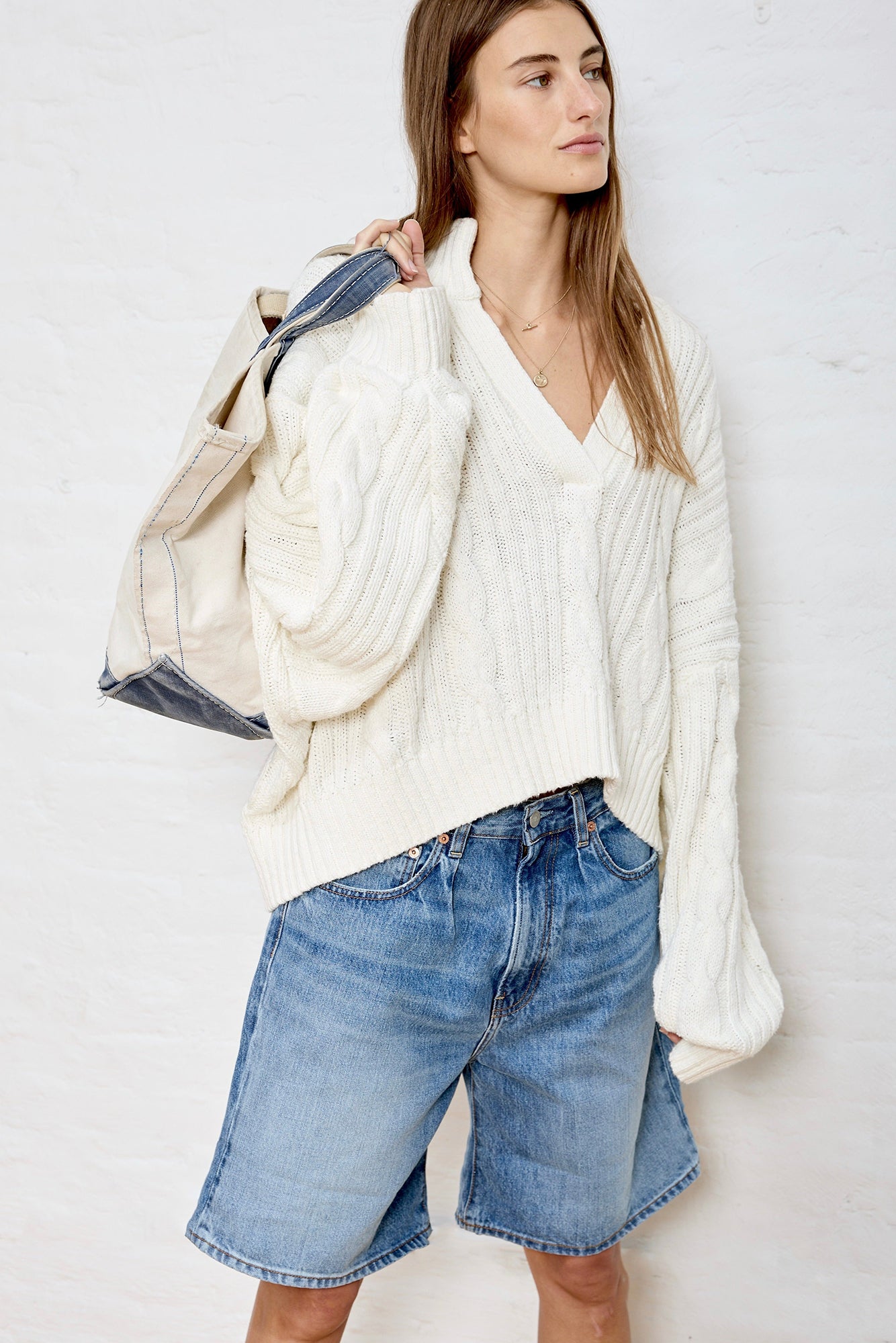 Pullover mit Zopfmuster und Schlitz am Hals - Weiß